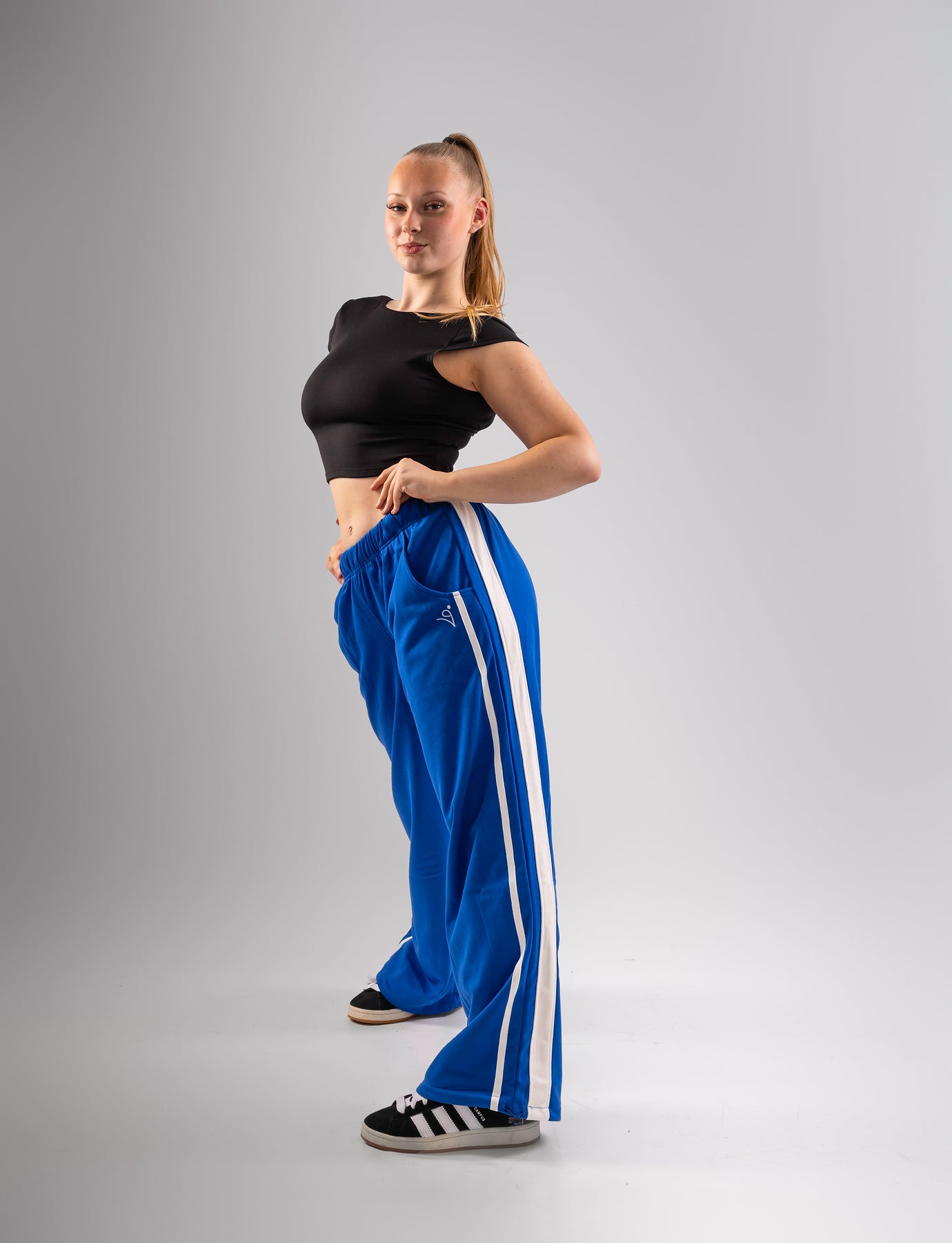 Blue joggers white stripe best sale